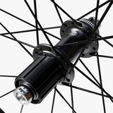 WHEEL, WH-RS710-C46-TL, REAR, 24H, FOR 11/12S, OLD:142MM, R:12MM E-THRU, TUBELESS, BLACK, W/TUBELESS TAPE, FOR CL DISC