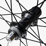 WHEEL, WH-RS710-C46-TL, FRONT, 24H, OLD:100MM, F:12MM E-THRU, TUBELESS, BLACK, W/TUBELESS TAPE, FOR CL DISC